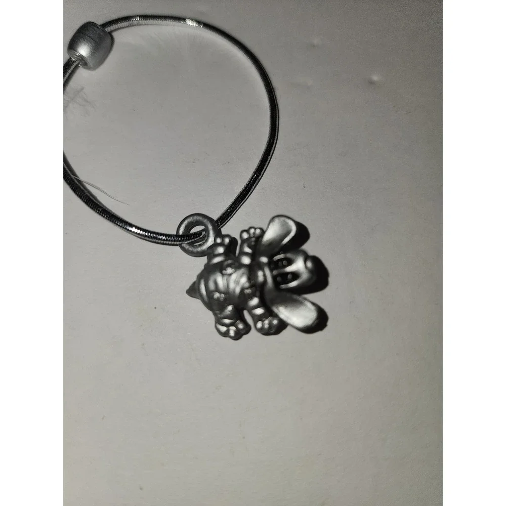 Vintage Plastic Pound‎ Puppies Charm